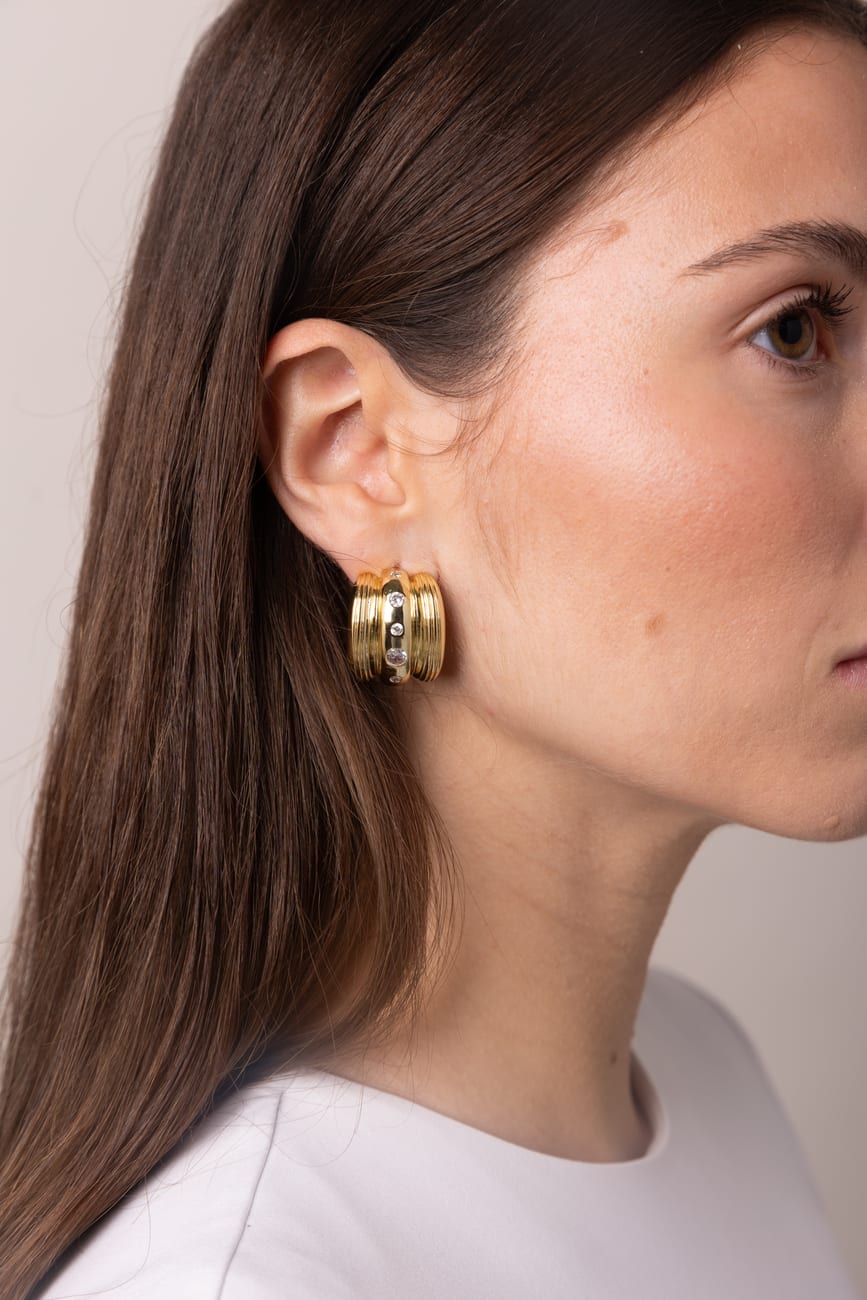 Gold earring close-up
