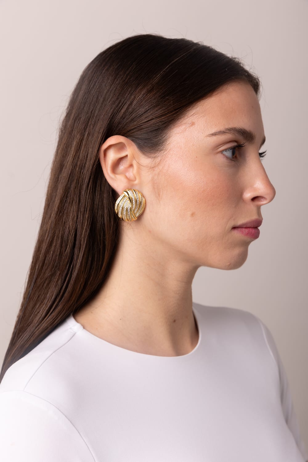 CHARM gold statement earring close-up